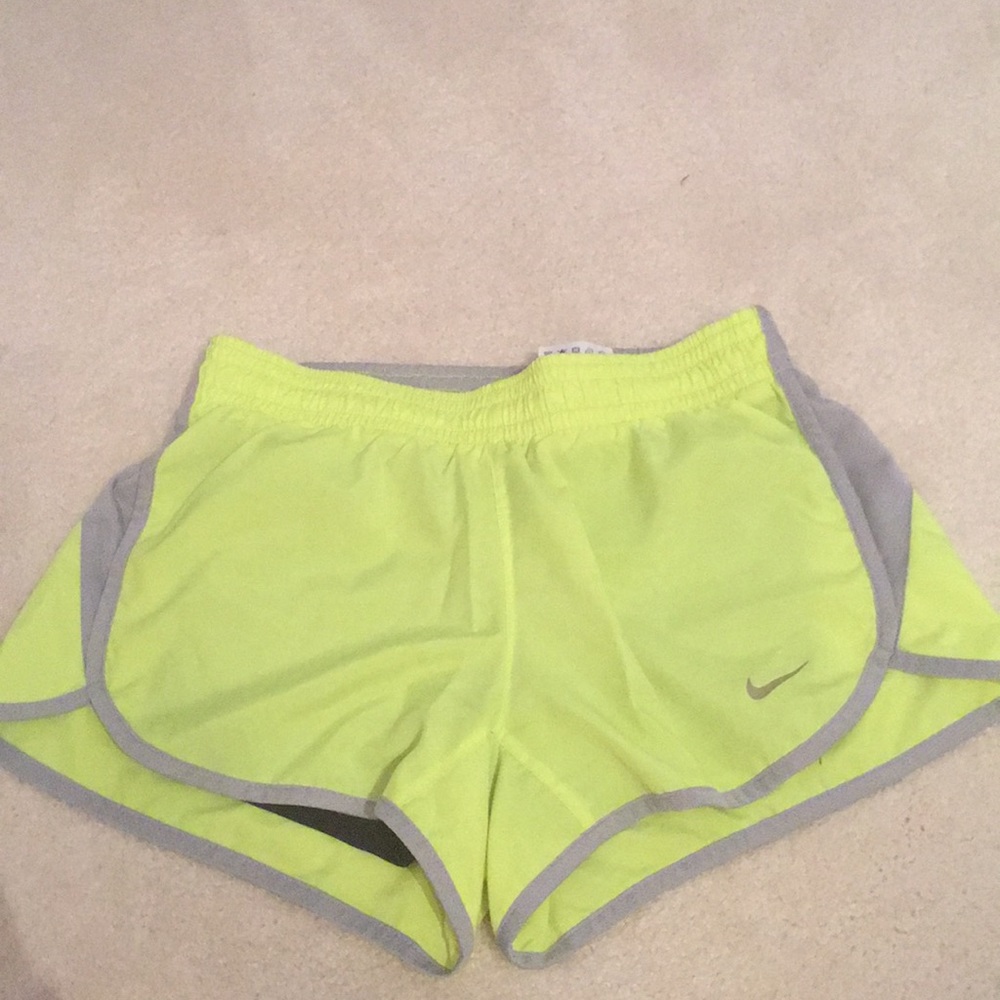 yellow nike dry fit shorts with built in spandex